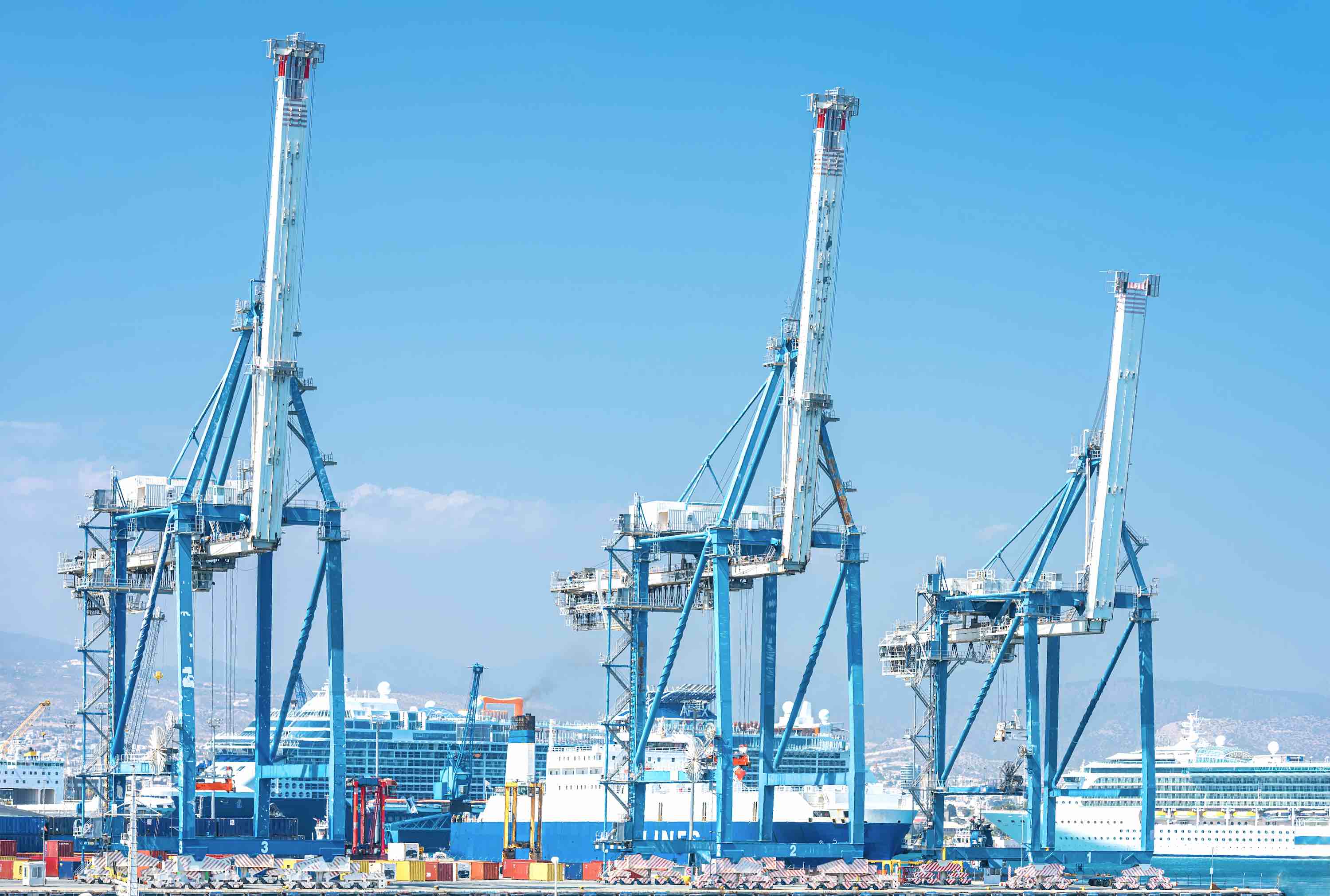 Three portal cranes in cargo port of Limassol, Cyprus